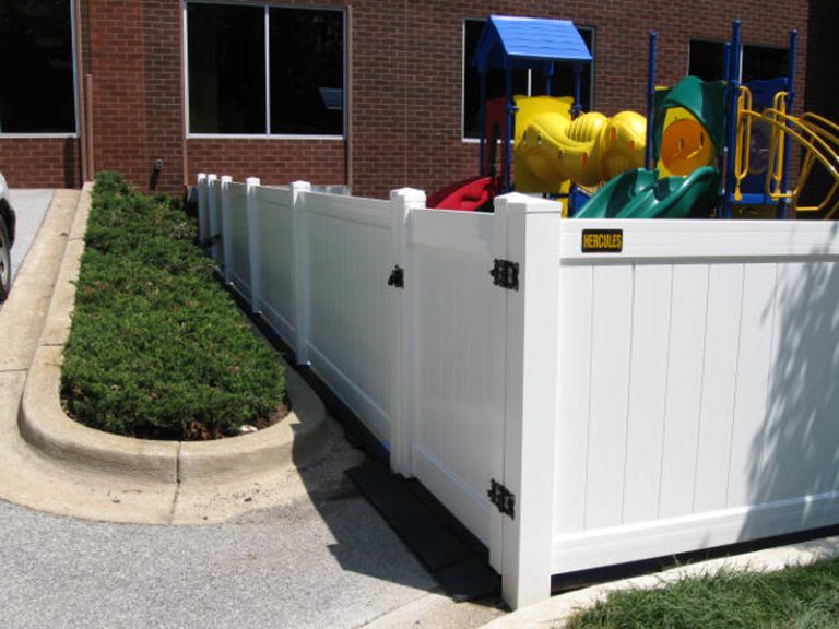 4 foot high solid board PVC Vinyl - Hercules Fence